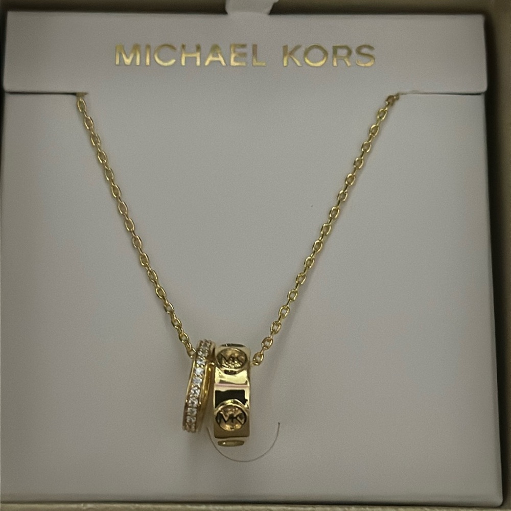 Michael Kors gold barrel necklace.